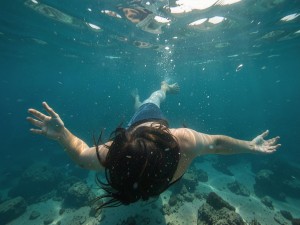Person underwater, photo